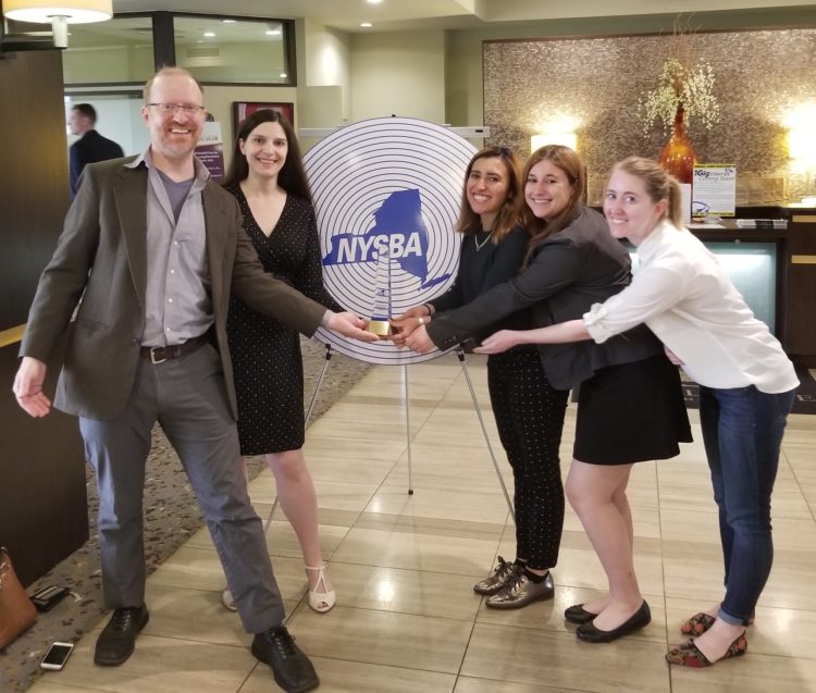 From left to right, at NYSBA Luncheon in Binghamton on Apr. 18: WRFI General Manager Felix Teitelbaum; News Director Laura Rosbrow-Telem; Producer Elena Piech; Producer Skylar Eagle; and Ithaca Voice Managing Editor Kelsey O'Connor. Photo credit: Ofri Telem