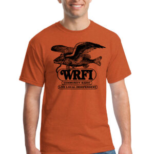 Model wearing an orange t-shirt with black ink; shirt shows an image of a flying fish above the words "WRFI / Community Radio / Live, Local, Independent"