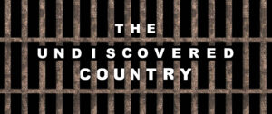 Prison bars in front of a black background with bold white letters that read "The Undiscovered Country"